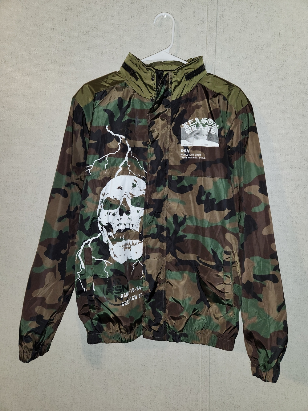 Reason Camouflage Windbreaker Jacket with White Skull Graphic